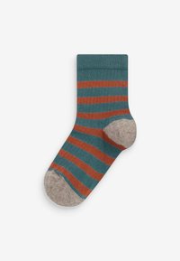 Calzino a strisce con strisce orizzontali teal e arancioni, con punta e tallone beige. Realizzato in un morbido materiale lavorato a maglia con bordo a coste.