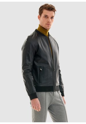 Lederjacke - schwarz