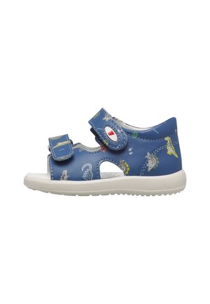 Sandalo blu per bambino con motivo di dinosauri, due cinturini regolabili in Velcro e suola bianca imbottita.