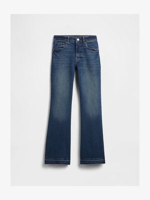 Džíny s rozšířenými nohavicemi v tmavě modré barvě s vybledlým efektem, mají zapínání na knoflík a zip, pět kapes a prošité detaily na lemech.