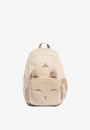 Beżowy plecak z przednią puszystą kieszenią w kształcie uśmiechniętej twarzy zwierzęcia z uszami, boczną kieszenią z siateczki i logo Adidas na górnej przedniej części.
