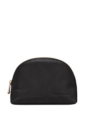 Black textured leather pouch with curved top, gold zipper hardware, and embossed brand name. Compact design for versatility and storage.