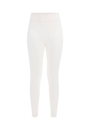 Collant bianchi con una superficie liscia, vita alta e un sottile motivo in rilievo su tutto il tessuto. Design aderente.