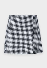 Mini gonna a fantasia houndstooth blu navy e bianco, realizzata in tessuto testurizzato, con forma aderente e vita piatta.