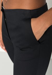 ARKET Chinos - black