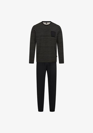 Stribet sort og creme langærmet bluse med lomme, kombineret med ensfarvede sorte bukser, lavet af blødt stof og med en afslappet pasform.