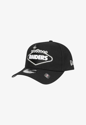Black cap featuring an embroidered "Las Vegas Raiders" logo in white, with a curved visor and adjustable back closure.