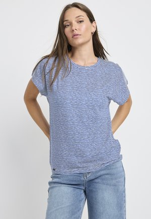 Short-sleeve T-shirt featuring blue and white horizontal stripes, round neckline, soft fabric, and relaxed fit. Paired with light blue jeans.