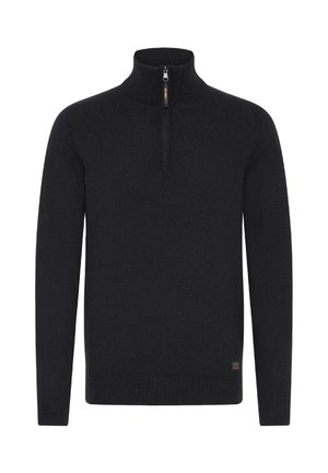 Čierny sveter s vysokým golierom a krátkym zipsom. Obsahuje dlhé rukávy a rebrovaný lem. Vyrobený z mäkkého pleteného materiálu.