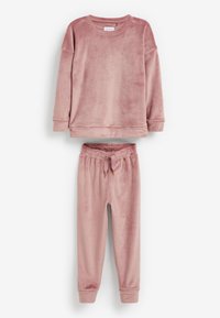 Pink velvety loungewear set featuring a long-sleeve top with round neckline and matching pants with an elastic waistband and drawstring.