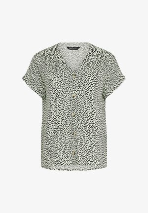 Short-sleeve button-up blouse with black irregular polka dots on white background, V-neck collar, and loose fit.