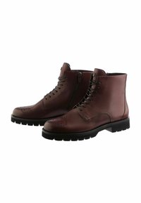 Stivaletti alla caviglia in pelle bordeaux con una combinazione di chiusura con lacci e cerniera, perforazioni decorative e una suola nera robusta.