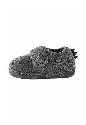 Pantofole grigie in feltro con una fascia in Velcro, caratterizzate da un design ricamato di un dinosauro e accenti neri a punta sul tallone. Suola in gomma testurizzata.
