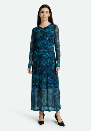 Abito maxi a maniche lunghe con motivo floreale astratto blu e verde, realizzato in tessuto trasparente con una texture liscia e una vita aderente.