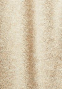 Beige stof met een zachte, gestructureerde oppervlakte, met een licht fuzzy uitstraling en subtiele variaties in tint. Geschikt voor kleding of huishoudtextiel.