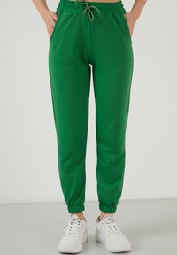 LELA - Tracksuit bottoms - benetton color Thumbnail Image 1