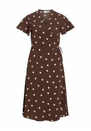 Bruine wikkeljurk tot op de knie met korte wapperende mouwen en witte stippen, met een zijstrik in de taille.