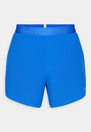 Sinised spordilühikesed püksid elastse vöökoha ja kollase aktsendiga taga, samuti diskreetne logo alumises paremas ees.