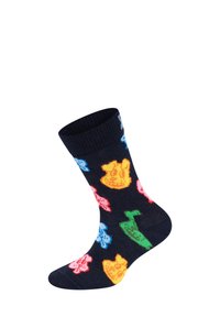 Barevné ponožky s hravými ikonami medvěda a hraček na tmavém pozadí, s ribbovaným lemem a bočním pohledem na ponožku.