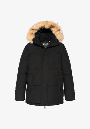 Chaqueta acolchada negra con capucha desmontable con ribete de piel sintética marrón, cierre de cremallera y dos bolsillos laterales. Diseño acolchado texturizado.