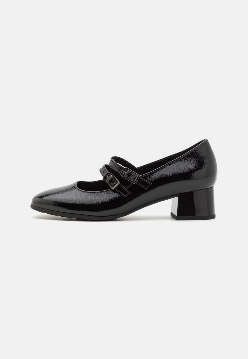 Chaussure Mary Jane en cuir verni noir avec deux brides à boucle et un petit talon carré, vue de profil sur fond blanc.