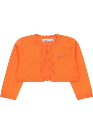 Lyse orange langærmet cropped cardigan til spædbørn, med en lille sløjfe med et hjertevedhæng på brystet og bølgekantede kanter.