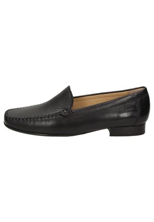 Black leather slip-on shoe with a rounded toe, stitched detailing on the front, and a low heel. Interior features a tan lining.