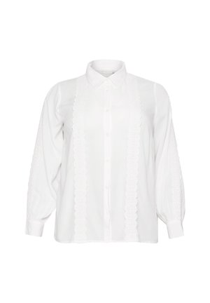 Biała bluzka z długimi bufkami, zapinana na guziki z misternymi koronkowymi wykończeniami po bokach i na środku, wykonana z gładkiego materiału.