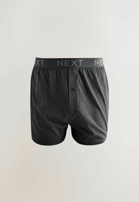 Tmavosivé bavlnené boxerky s elastickým pásom, na ktorom je logo "NEXT". Vpredu majú jediné zapínanie na gombík. Mäkká textúra a voľný strih.
