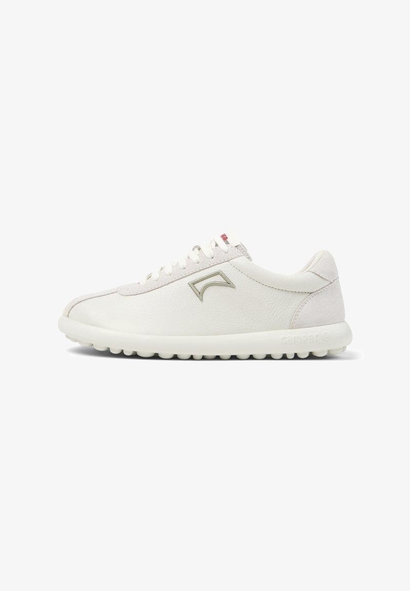 White leather sneakers with a light gray suede accent, featuring a rounded toe, lace-up design, and textured rubber sole.