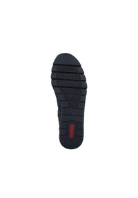 Black rubber sole with a textured tread pattern, featuring a prominent red logo. Contoured shape designed for grip and stability.