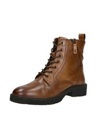 Bruine leren veterschoen met zijrits en zwarte rubberen zool, ontworpen voor enkellend steun en casual of buitengebruik.