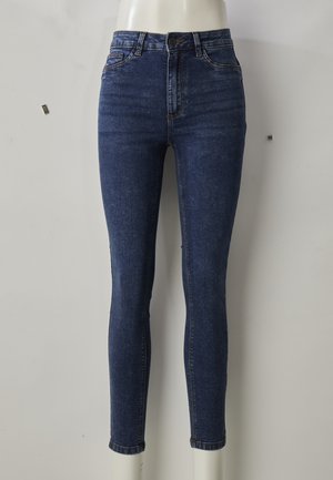 Smala jeans i mörkblå denim, högmidjade med en figurnära passform, utrustade med framfickor, dragkedja och subtila veck på låren.