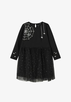 Robe noire à manches longues, jupe en tulle, broderie en toile d'araignée et araignée argentées, pois argentés dispersés sur la jupe, fermeture au dos en forme de trou de serrure.