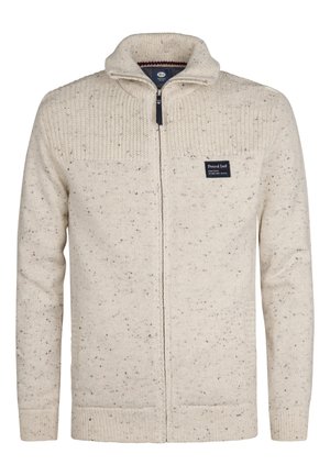Pull en tricot beige zippé sur toute la longueur avec un motif marbré, col, poignets et ourlet côtelés, avec un petit patch logo "Petrol Ind" noir sur la poitrine.