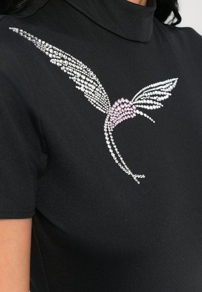 Black top featuring a high collar and an intricate design of rhinestones forming wings, with pink accents in the center. Smooth texture.