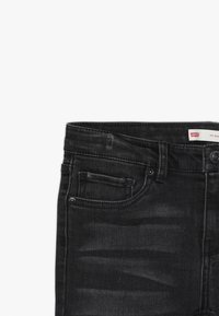Levi's® Vaqueros pitillo - black denim