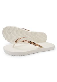 White flip-flop sandals with a textured rubber sole. Thin straps feature a beige and black leopard print pattern. Smooth, flexible material.