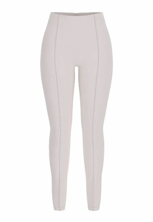 Leggings aderenti a vita alta di colore grigio chiaro con dettagli di cuciture verticali sulla parte anteriore e una fascia elastica liscia in vita.