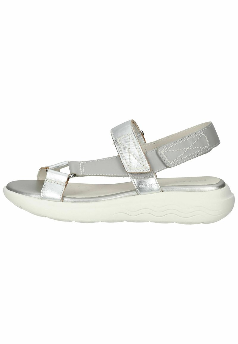 Sandali donna argento con due cinturini regolabili, suola imbottita e tomaia liscia e elegante. Dettagli texturizzati sui cinturini.