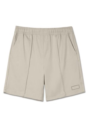 Beige atletische shorts gemaakt van zachte stof. Heeft een elastische tailleband, twee zijzakken en een decoratieve gestikte label op de zoom.