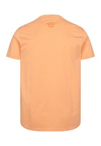 Koszulka z krótkim rękawem z jasnopomarańczowej bawełny. Posiada okrągły dekolt i małe nadrukowane logo na górnej części pleców. Prosty, luźny krój.