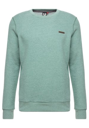 Jasnozielona bluza z okrągłym dekoltem, długimi rękawami i małą prostokątną naszywką z logo na lewym biuście.