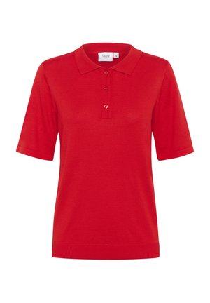 Punane polo särk, mis on valmistatud pehmest ja siledast kangast. Omab traditsioonilist kraed, kolme nupuga kanga ja lühikesi varrukaid ribakraatidega.