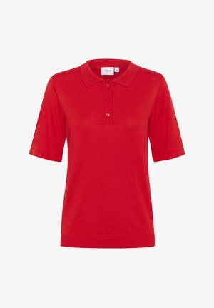 Polo shirt rosso realizzato in tessuto morbido e liscio. Presenta un colletto tradizionale, una chiusura con tre bottoni e maniche corte con polsini a costine.