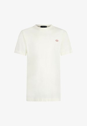 T-shirt a maniche corte, con collo rotondo, in cotone avorio, caratterizzato da un piccolo logo rosso sulla parte sinistra del petto. Texture morbida, vestibilità regolare.