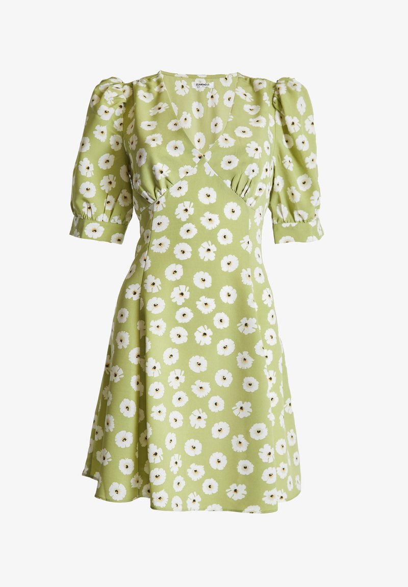 Robe portefeuille vert clair avec motif floral blanc, manches courtes bouffantes et taille cintrée.