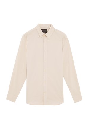 Lys beige langærmet skjorte lavet af bomuld. Har en knap-ned krave, frontplacket med knapper og knap-lukninger ved håndleddene. Glat tekstur.