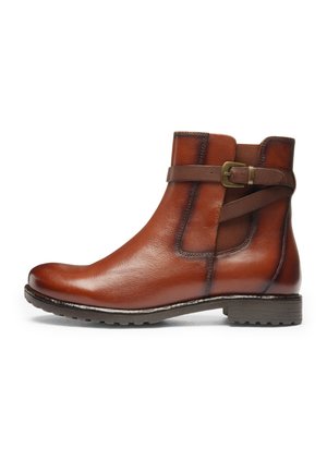 Brown leather ankle boot with side buckle strap, elastic panel, rounded toe, and textured rubber sole, shown in profile on a white background.