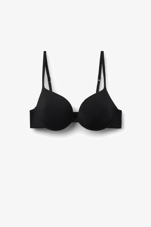 Soutien-gorge noir rembourré avec armatures, bretelles fines réglables et bonnets lisses, présenté sur fond blanc.